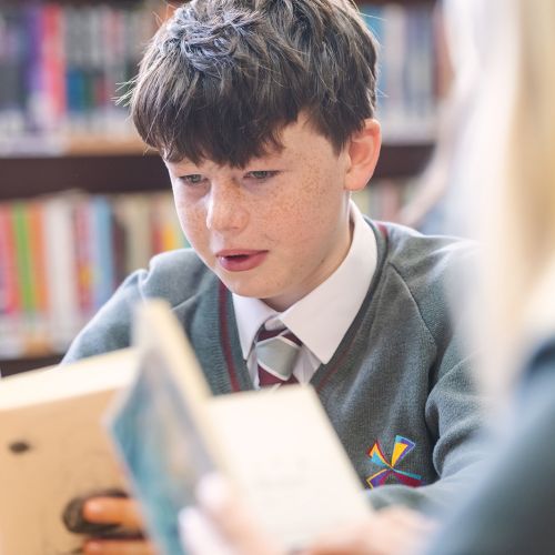 Library Boy with book 1